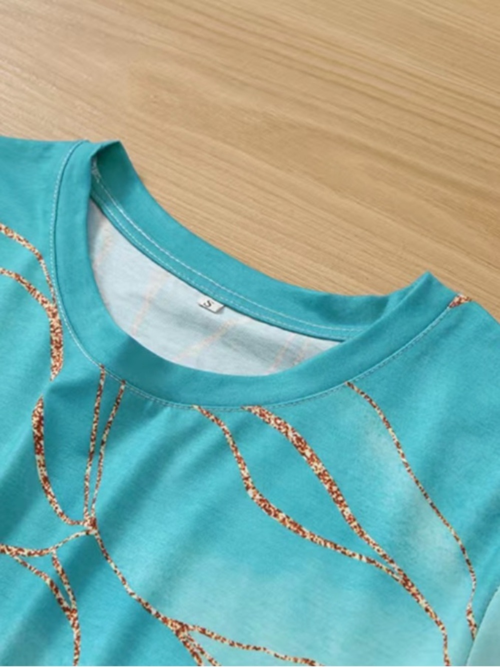 Women's Teal and White Ombre Short Sleeve Top with Gold Leaf Detail - Picture 2 of 6